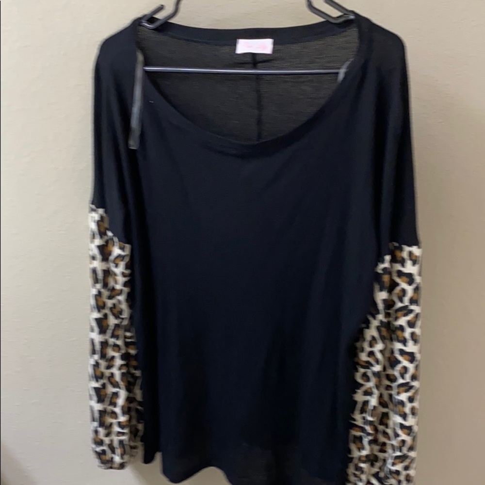 Brand new with tags. Cute with leggings.